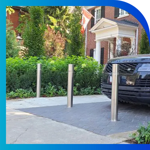 Car in Driveway with Bollards